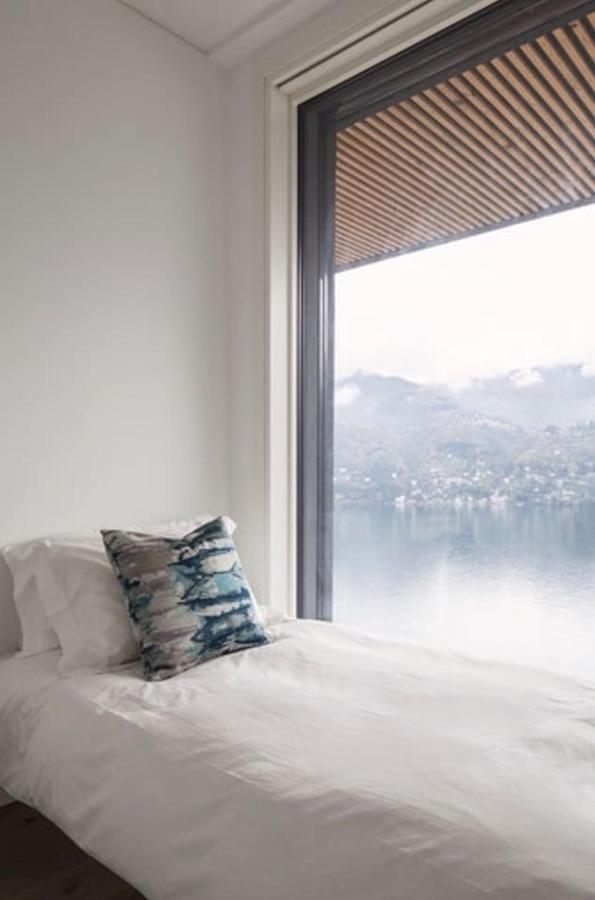 Ferienwohnung Ulivi Luxury Loft & Pool - The House Of Travelers Carate Urio Exterior foto